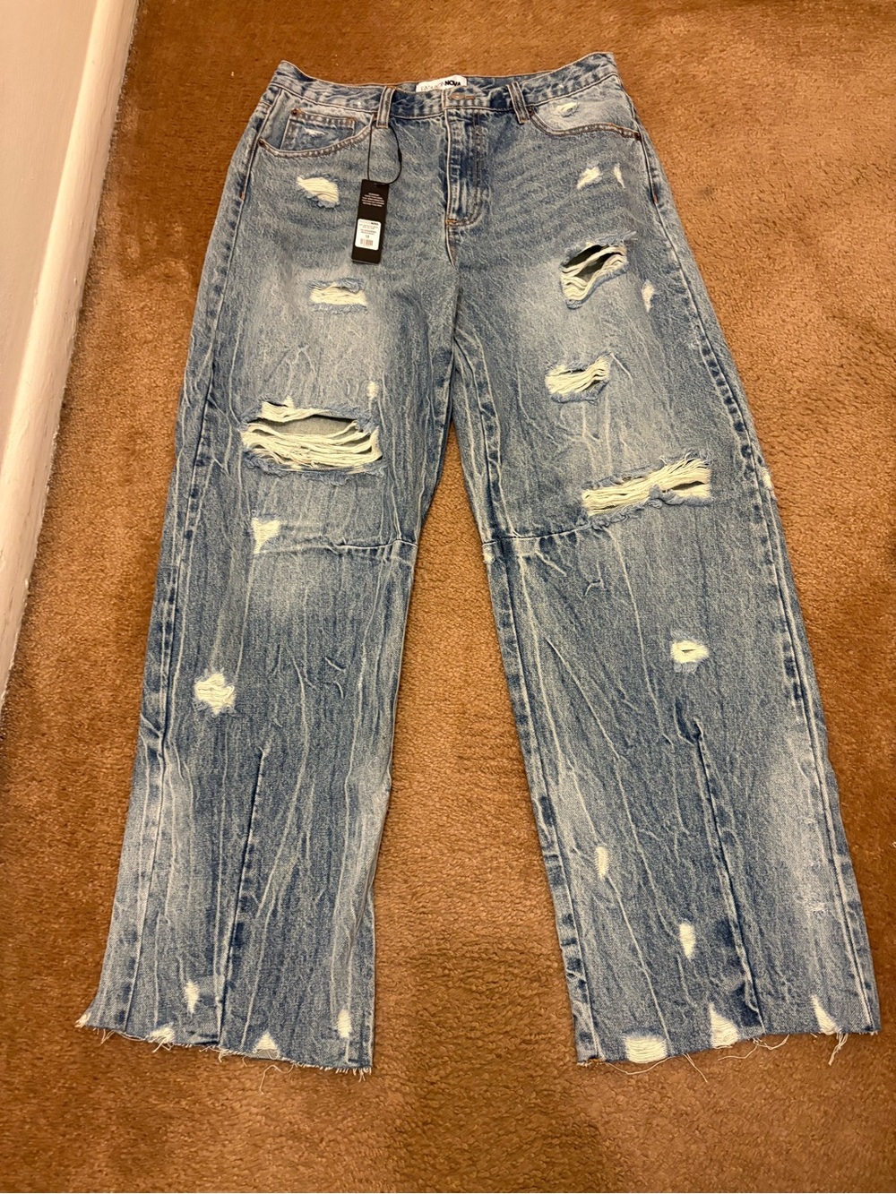 Fashion Nova Distressed Light Blue Flare Jeans